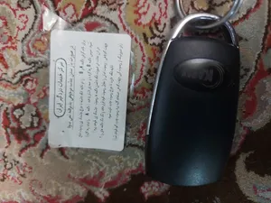 تجریه خرید ریموت بلوتوثی درب پارکینگ مدل AZ-433