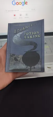 اسباب بازی زینتی مستر گرین مدل کتاب های مدرسه هری پاتر طرح معجون سازی شاهزاده دورگه