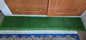 تجریه خرید چمن مصنوعی مدل نواری سایز 5x500 سانتی متر
