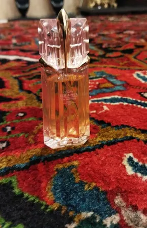 عطر جیبی زنانه نیچ برند کالکشن مدل Alien Flora -197 حجم 25 میلی لیتر