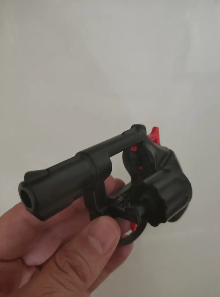 تفنگ اسباب بازی مدل ترقه ای به همراه یک بسته تیر