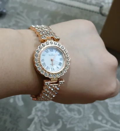 ساعت مچی عقربه ای زنانه مدل دستبندی نگین دار کد 02