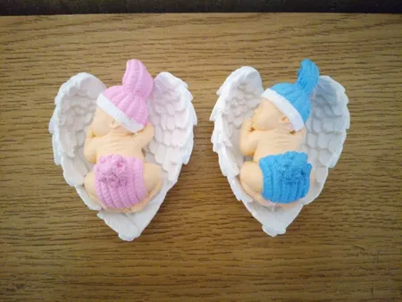 مجسمه سنگی مدل نوزاد روی بال فرشته