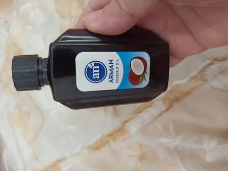 روغن نارگیل آرمان مدل Pure Oil حجم 60 میلی لیتر