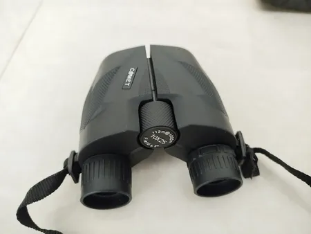 دوربین دوچشمی کومت مدل 10X25 M2021