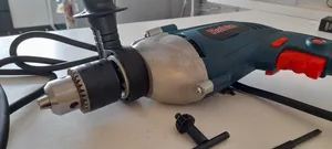 تجریه خرید دریل چکشی 30 میلی‌متری 810 وات رابین مدل R1015