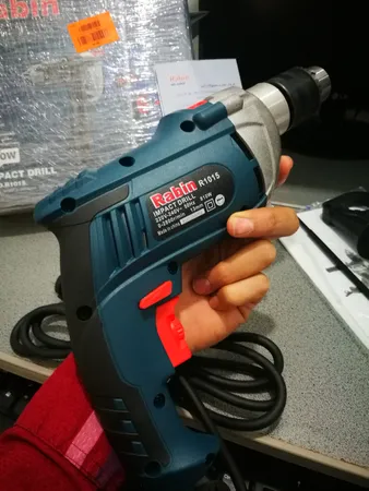 دریل چکشی 30 میلی‌متری 810 وات رابین مدل R1015