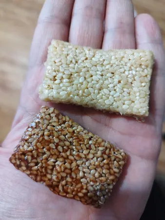 کنجد عسلی پذیرایی عقاب 10 گرم بسته 32 عددی