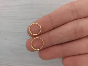 تجریه خرید گوشواره طلا کم اجرت 18 عیار زنانه طلای ترنم مدل حلقه ای