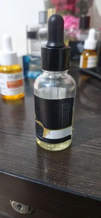 سرم مو لاکچری کوین مدل سیر سیاه حجم 300 میلی لیتر