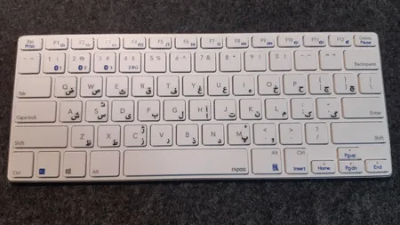 کیبورد و ماوس بی سیم رپو مدل 9000G