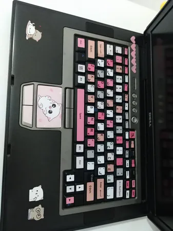 استیکر لپ تاپ مدل cute cat 02 مناسب برای لپ تاپ 15 تا 17 اینچ به همراه برچسب حروف فارسی کیبورد