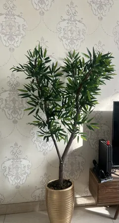 گل مصنوعی مدل بوته برگ بامبو لمسی بسته 12 عددی