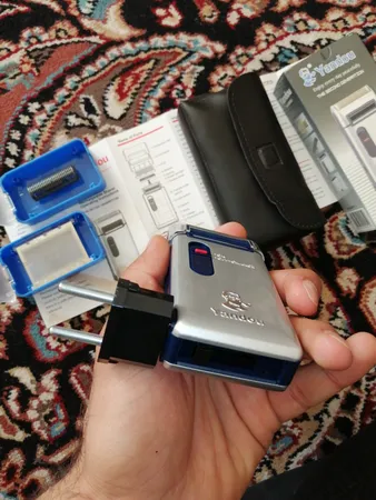 ماشین اصلاح موی صورت یاندو مدل Sv-w301u به همراه تیغه و توری یدک