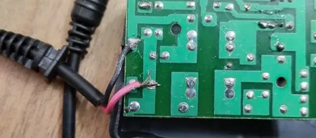 آداپتور 12 ولت 2 آمپر دی ای پی مدل dk1203_shenzhen