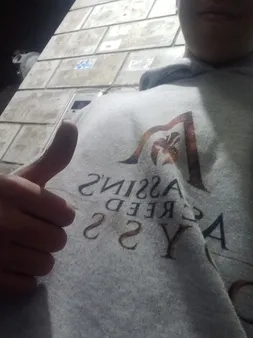 هودی مردانه طرح Assassins کد S436 رنگ طوسی