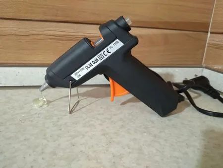 دستگاه چسب تفنگی جانسون مدل FL-138B به همراه یک عدد چسب حرارتی جانسون بصورت رایگان