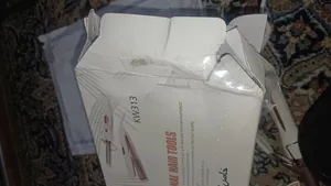 تجریه خرید اتو مو کنورث مدل kw313 به همراه فر کننده مو