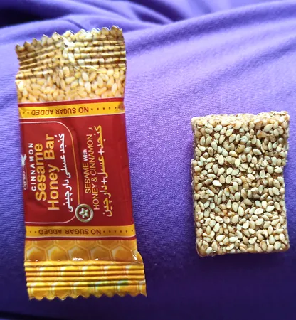 کنجد عسلی پذیرایی عقاب 10 گرم بسته 32 عددی