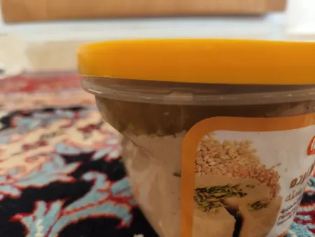 حلوا ارده پسته ای شیررضا - 448 گرم