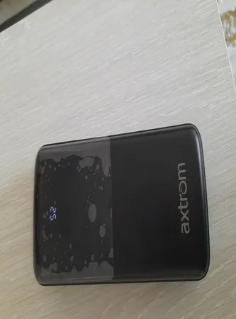 پاوربانک 18 وات اکستروم مدل APB20K22W-B ظرفیت 20000 میلی آمپر ساعت