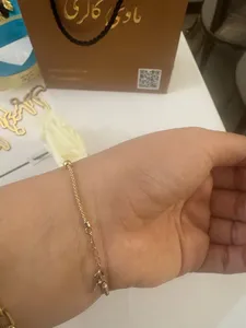 تجریه خرید دستبند طلا 18 عیار زنانه ماوی گالری مدل پاپ کورن و گوی