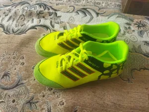 تجریه خرید کفش فوتبال پسرانه مدل استوک بلند