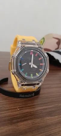 ساعت مچی عقربه ای مدل دوزمانه پمپی قاب شفافy.m