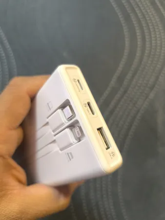 پاوربانک 15 وات رامووس مدل 141 ظرفیت 10000 میلی آمپر ساعت