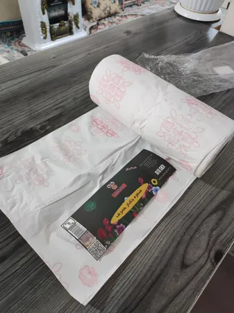 سفره یکبار مصرف سالینا پلاست مدل گلدار رول 1000 متری