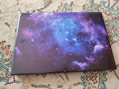 استیکر لپ تاپ راتیانا مدل space15 مناسب برای لپ تاپ 15 تا 17 اینچ به همراه برچسب حروف فارسی کیبورد