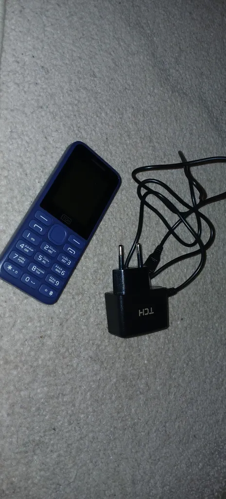 گوشی موبایل تی سی اچ مدل ARC دو سیم‌کارت ظرفیت 4 مگابایت