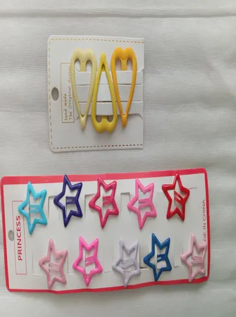 گیره مو دخترانه مدل تق تقی ستاره ای پاستیلی بسته 10 عددی