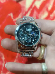 تجریه خرید ساعت مچی عقربه‌ای مردانه  کوارتز پوداگار مدل B 809