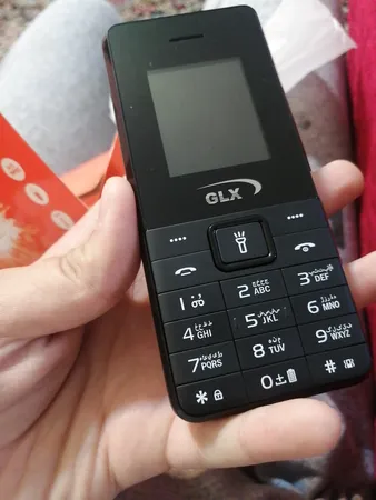 گوشی موبایل جی ال ایکس مدل iT5606 دو سیم کارت ظرفیت 32 مگابایت و رم 32 مگابایت