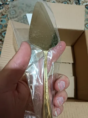 کفگیر کیک ناب استیل مدل فلورانس