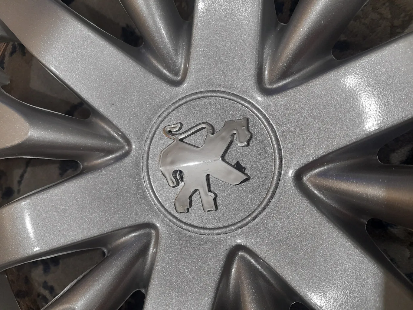 قالپاق چرخ ابویی  مدل New Balance سایز 14 اینچ مناسب برای پژو 405 بسته 4 عددی