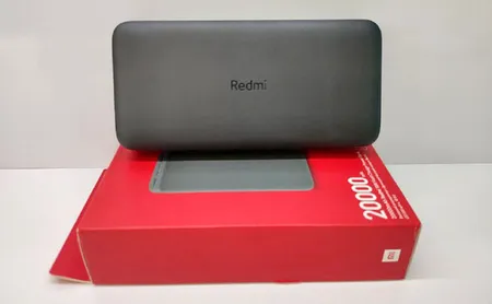 پاوربانک 18 وات شیائومی مدل Redmi PB200LZM ظرفیت 20000 میلی آمپرساعت به همراه شارژر دیواری سامسونگ و کابل تبدیل