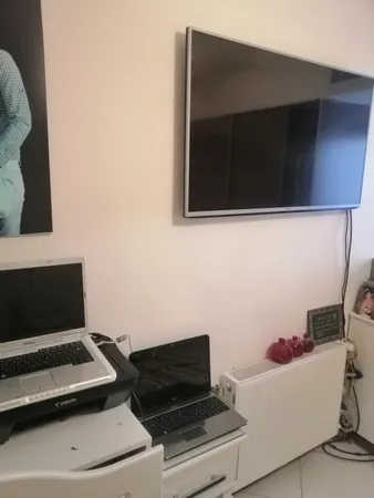 پایه دیواری برتاریو مدل S50 مناسب برای تلویزیون های 40 تا 50 اینچی