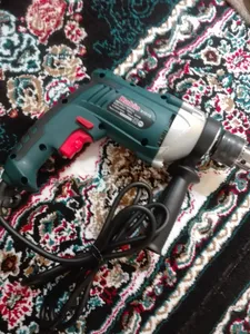 تجریه خرید دریل چکشی 30 میلی‌متری 810 وات رابین مدل R1015