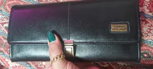 تجریه خرید کیف پول فراگامو مدل F145