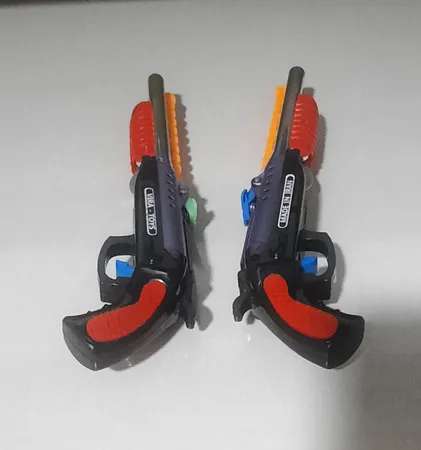 تفنگ بازی مدل دولول بسته 120 عددی