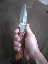 تجریه خرید چاقوی سفری باک مدل چوبی 27CT