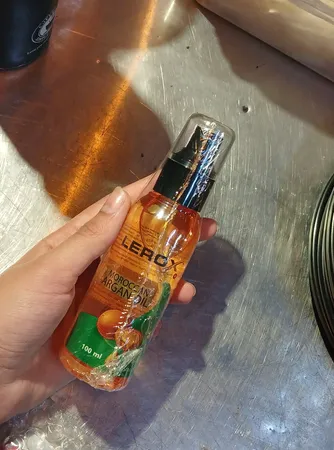 روغن آرگان درخشان کننده لروکس مدل Moroccan مناسب برای انواع مو حجم 100 میلی لیتر