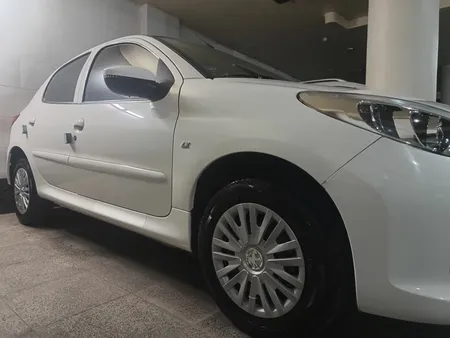 قالپاق چرخ مدل آریا سایز 14 اینچ مناسب برای پژو 206 مجموعه 4 عددی