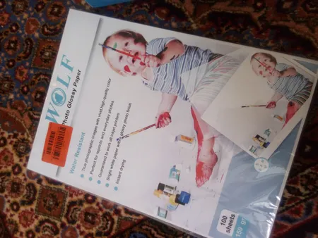 کاغذ فتو گلاسه 150 گرم ولف سایز A4