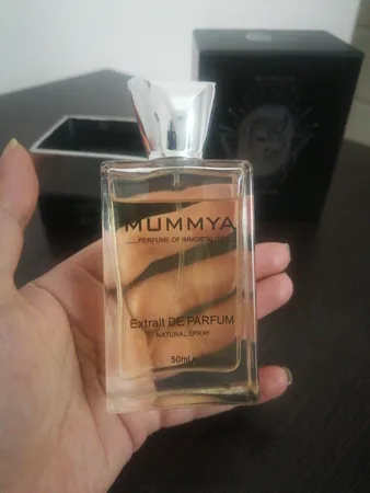 اکستریت پرفیوم مردانه مومیا مدل تام فورد توسکان لدر با رایحه گرم حجم 50 میلی لیتر