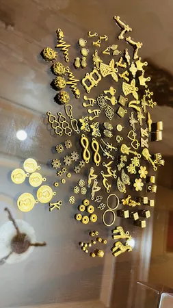 آویز دستبند مدل دنیای زیبا کد AD 0145 مجموعه 60 عددی