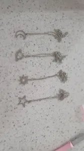 تجریه خرید گردنبند مدل ماه و خورشید و ستاره و زحل بسته چهار عددی