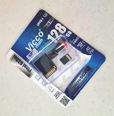 کارت حافظه micro SDXC ویکومن مدل 633X Plus کلاس 10 استاندارد UHS-I U3 سرعت 90MBS ظرفیت 128 گیگابایت به همراه کارت خوان